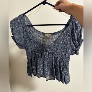 Blue blouse with little white flowers